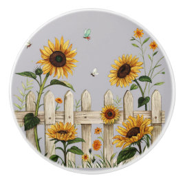 Sonnenblumen entlang des weißen Picketzauns Keramikknauf