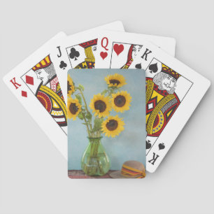 Sonnenblumen in Vasen auf einem Tisch Spielkarten