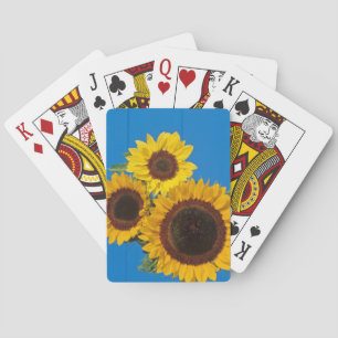Sonnenblumen vor blauem Zaun Spielkarten