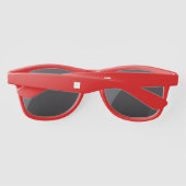 Sonnenbrille aus rotem Kunststoff (Rückseite)