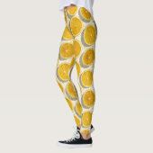 Sonnendurchflutetes Orangen-Scheiben-Muster Leggings (Links)