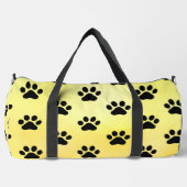 Sonnengelb schwarzer Pfotenabdruck Duffle Bag (Vorderseite)