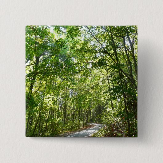 Sonnenlicht auf dem Waldweg im Centennial Park Button (Vorderseite)