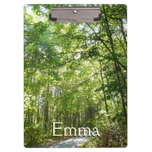 Sonnenlicht auf dem Waldweg im Centennial Park Klemmbrett