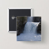 Sonnenlicht auf Wasserfällen auf der Seite eines Button (Vorne & Hinten)