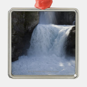 Sonnenlicht auf Wasserfällen auf der Seite eines Silbernes Ornament