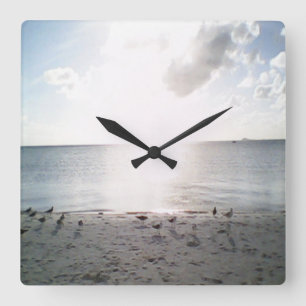 Sonnenruhm an der Strandquadratwanduhr Quadratische Wanduhr