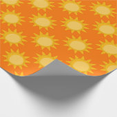 Sonnenschein-Sonnenmuster-Design auf Orange Geschenkpapier (Ecke)