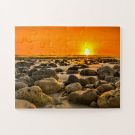 Sonnenuntergang am Felsstrand Puzzle