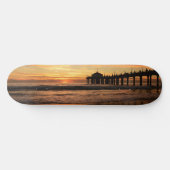 Sonnenuntergang am Pier Skateboard (Horizontal)