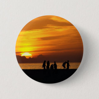 Sonnenuntergang am Strand Button
