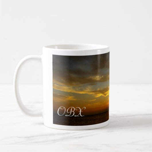Sonnenuntergang auf dem Ton Kaffeetasse (Links)