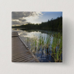 Sonnenuntergang auf einem kleinen See Button