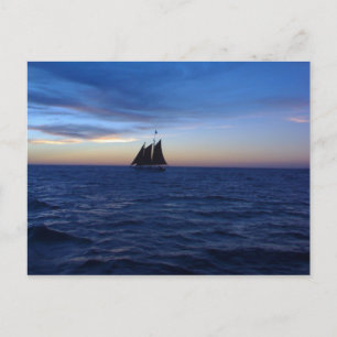 Sonnenuntergang auf Segelbooten Postkarte