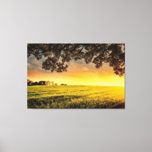 Sonnenuntergang in einer ländlichen Landschaft Leinwanddruck