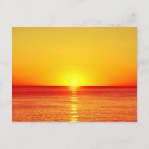 Sonnenuntergang über dem Meer Postkarte