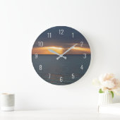 Sonnenuntergang über dem Ozean, der durch die Wolk Große Wanduhr (Zuhause)