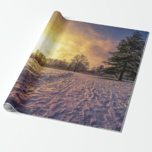 Sonnenuntergang über dem schneebedeckten Winterpar Geschenkpapier