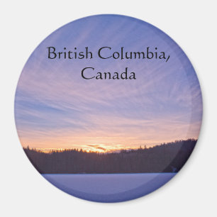 Sonnenuntergang über dem schneebedeckten Wintersee Magnet