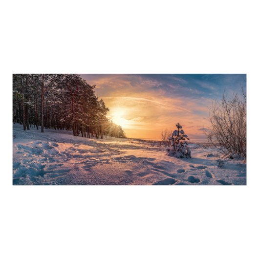 Sonnenuntergang über der schneebedeckten Winterküs Fotodruck (Vorne)