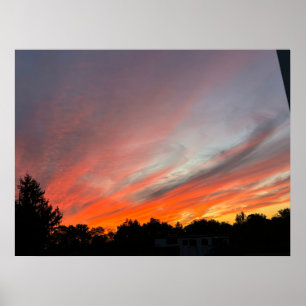 Sonnenuntergang über einem Feld Poster