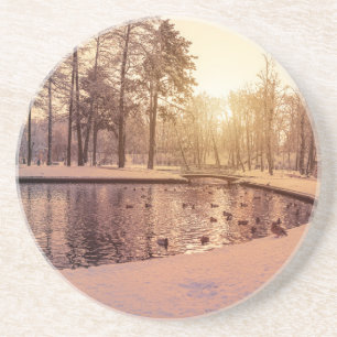 Sonnenuntergang über Park mit einem kleinen eisige Getränkeuntersetzer