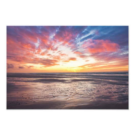 Sonnenuntergang über Strand und Meer Fotodruck (Vorne)