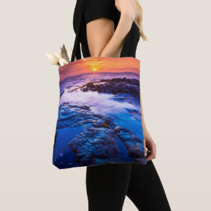 Sonnenuntergang und Gezeitenbecken auf Hawaii Tasche
