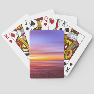 Sonnenuntergangs Himmel über Strand und Meer Spielkarten