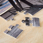 Sonnenuntergangsstrandansicht von rustikaler Holzt Puzzle (Seite)