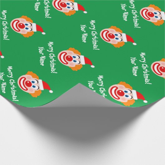 Sonniger Zirkusclown mit Weihnachtsmannmütze Weihn Geschenkpapier (Ecke)