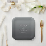 Sophisticated Gray Minimalist Wedding Pappteller<br><div class="desc">This elegant wedding plate features a minimalist design with a gradient gray background that transitions from light to dark. The layout is centered, showcasing bold, uppercase names in a clean sans-serif font, complemented by a stylish cursive "and" for added sophistication. Below the names, the date is presented in a lighter...</div>