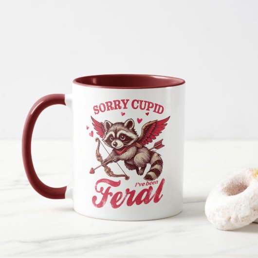 "Sorry Cupid I've Feral" Raccoon Tasse (Mit Donut)