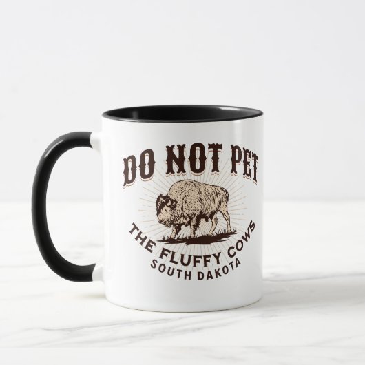 South Dakota hält das Bison der flauschigen Kühe n Tasse (Links)