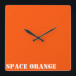 Space orange quadratische wanduhr<br><div class="desc">Show your colors with pride!  Ever dreamed of becoming an astronaut? Then this should make you feel in touch with your dream for this shade of international orange is the color of astronaut suits.</div>