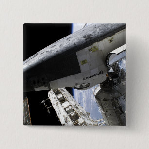 Space Shuttle Discovery dotiert Button