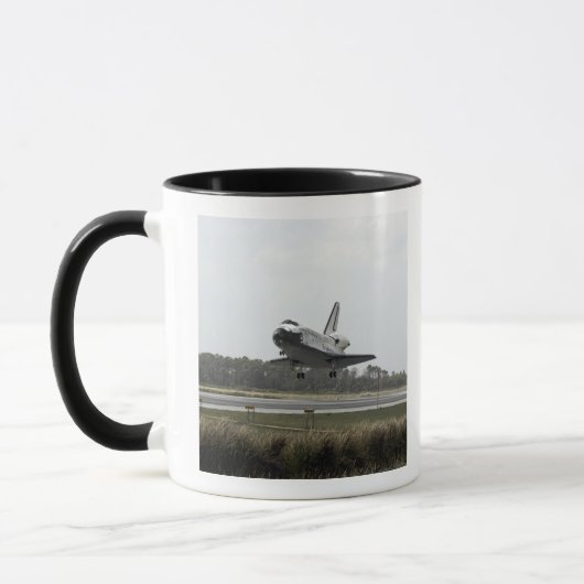 Space Shuttle Discovery geht Landung an Tasse (Links)
