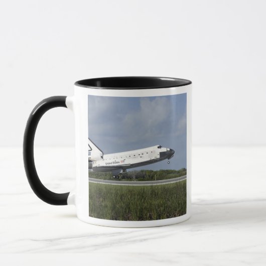 Space Shuttle Discovery landet auf der Runway 33 Tasse (Links)