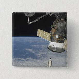 Space Shuttle Endeavour, ein Sojus-Raumschiff Button