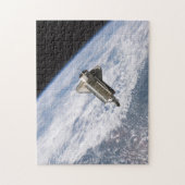 Space Shuttle STS115 Atlantis Undock ISS 2006 Puzzle (Vertikal)