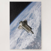 Space Shuttle STS115 Atlantis Undock ISS 2006 Puzzle (Vertikal)