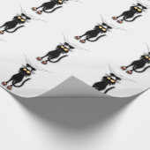 Spaß-schwarze Katze, die unten Packpapier fällt (Ecke)