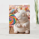 Spaßiges Meerschweinchen mit Marshmallow, das an d Karte (Vorderseite)