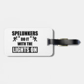 Spelunker machen es mit den Lichtern auf Gepäckanhänger (Rückseite horizontal)