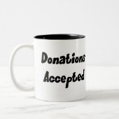 Spenden nahmen Tasse an (Links)