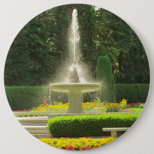 Spenden von Springbrunnen im Blumengarten Button