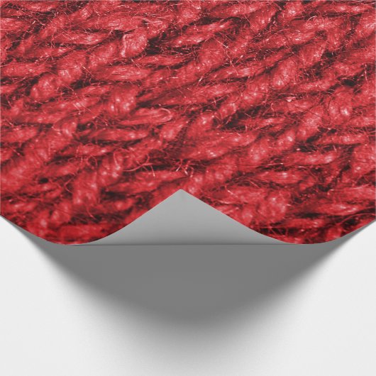 Sperrige rote Strickjacke-Strick-Beschaffenheit Geschenkpapier (Ecke)