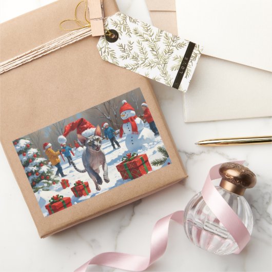 Sphynx Cat läuft im Schnee mit Weihnachtsmütze Rechteckiger Aufkleber (Schenken)
