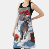 Sphynx Cat läuft im Schnee mit Weihnachtsmütze Schürze (InSitu)
