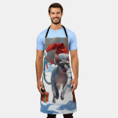 Sphynx Cat läuft im Schnee mit Weihnachtsmütze Schürze (Getragen)